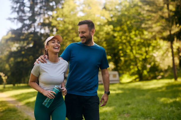 A couple walking together along a quiet path